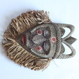 African mask with raffia and kaolin dots