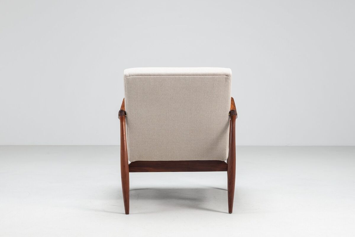 Sculptural Danish lounge chair in teak and fabric Denmark 1960