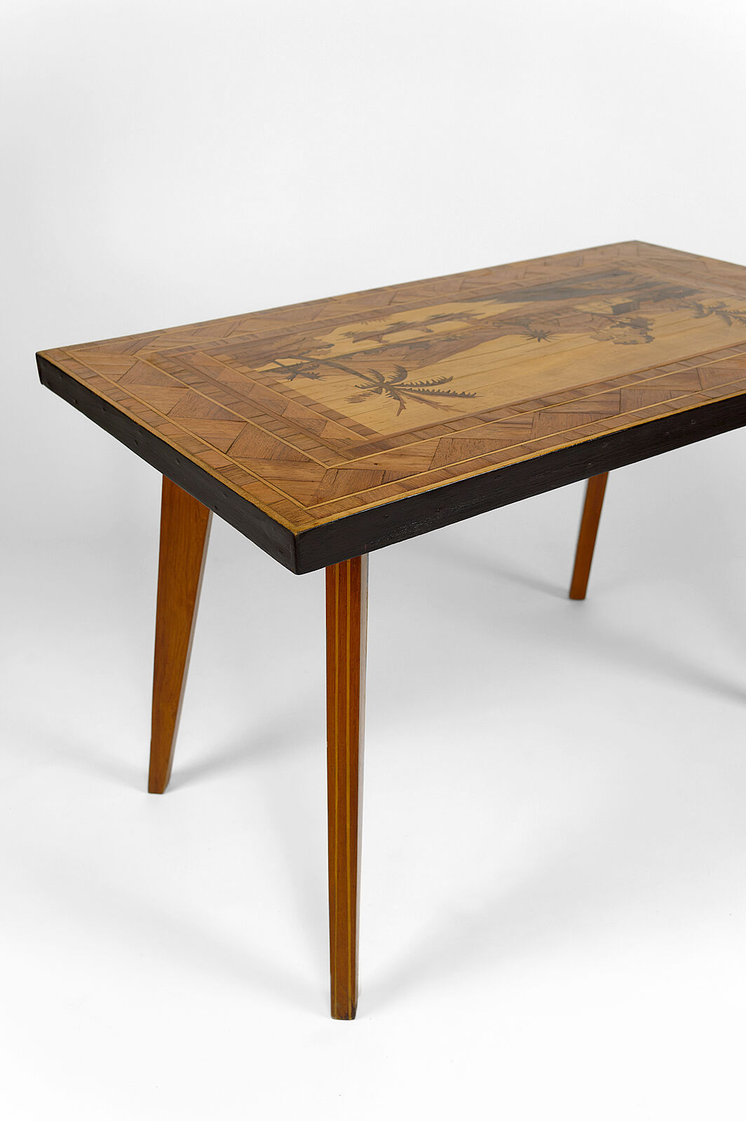African Midcentury coffee table in inlaid wood, circa 1960