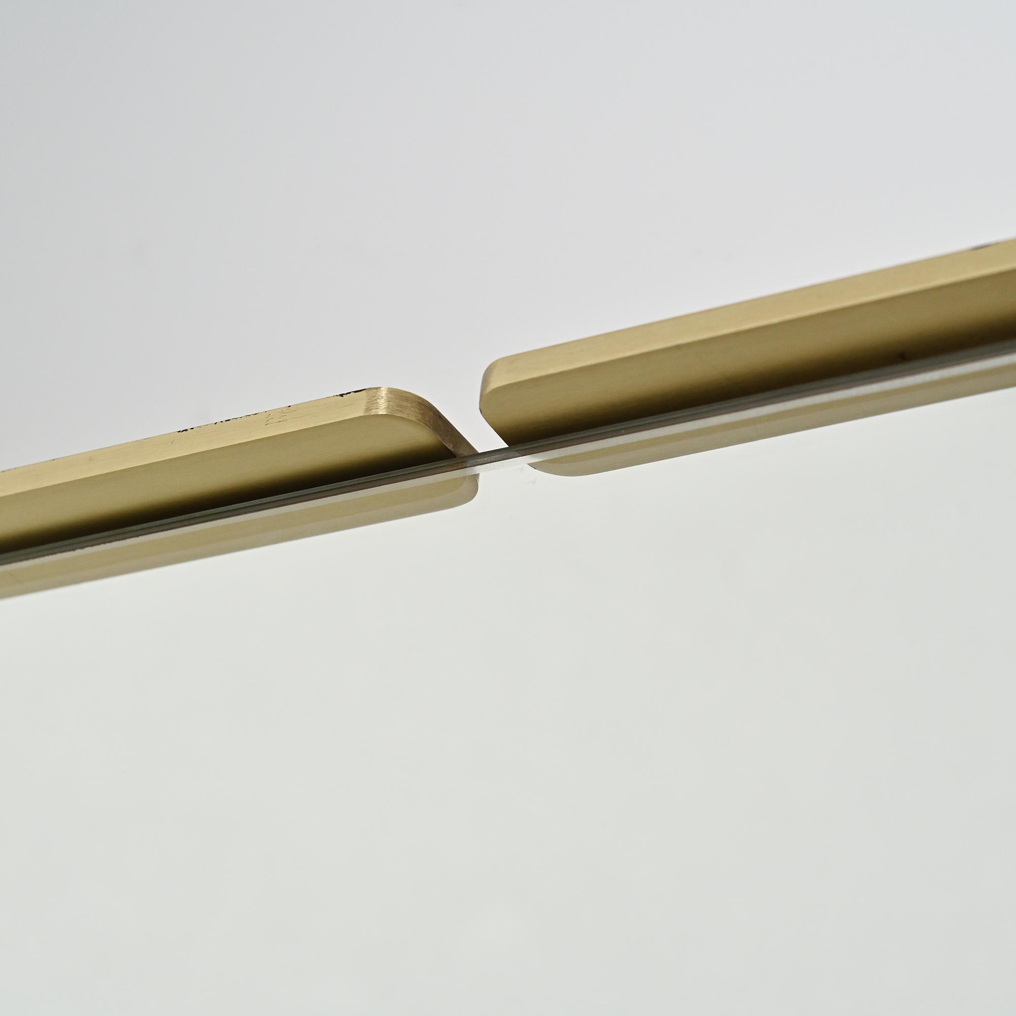 Rectangular mirror in gilded metal, circa 1970