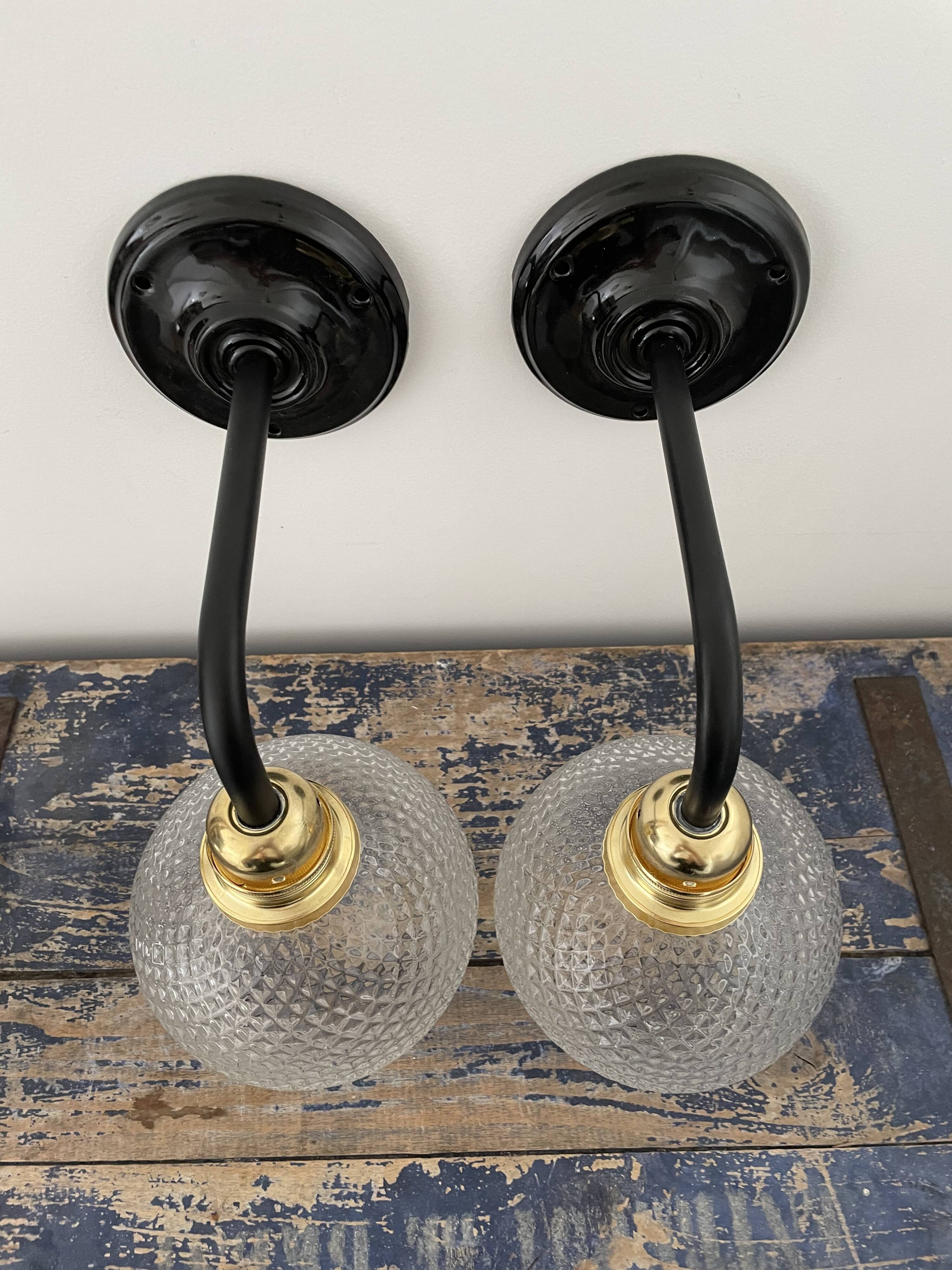 Set of two vintage electrified electrified glass wall lamps