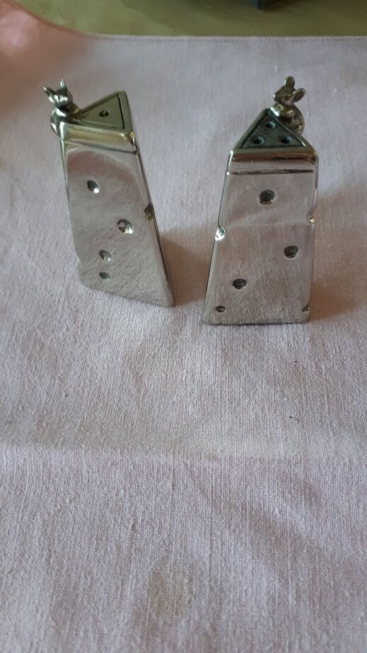 Salt shaker and silvered metal pepper