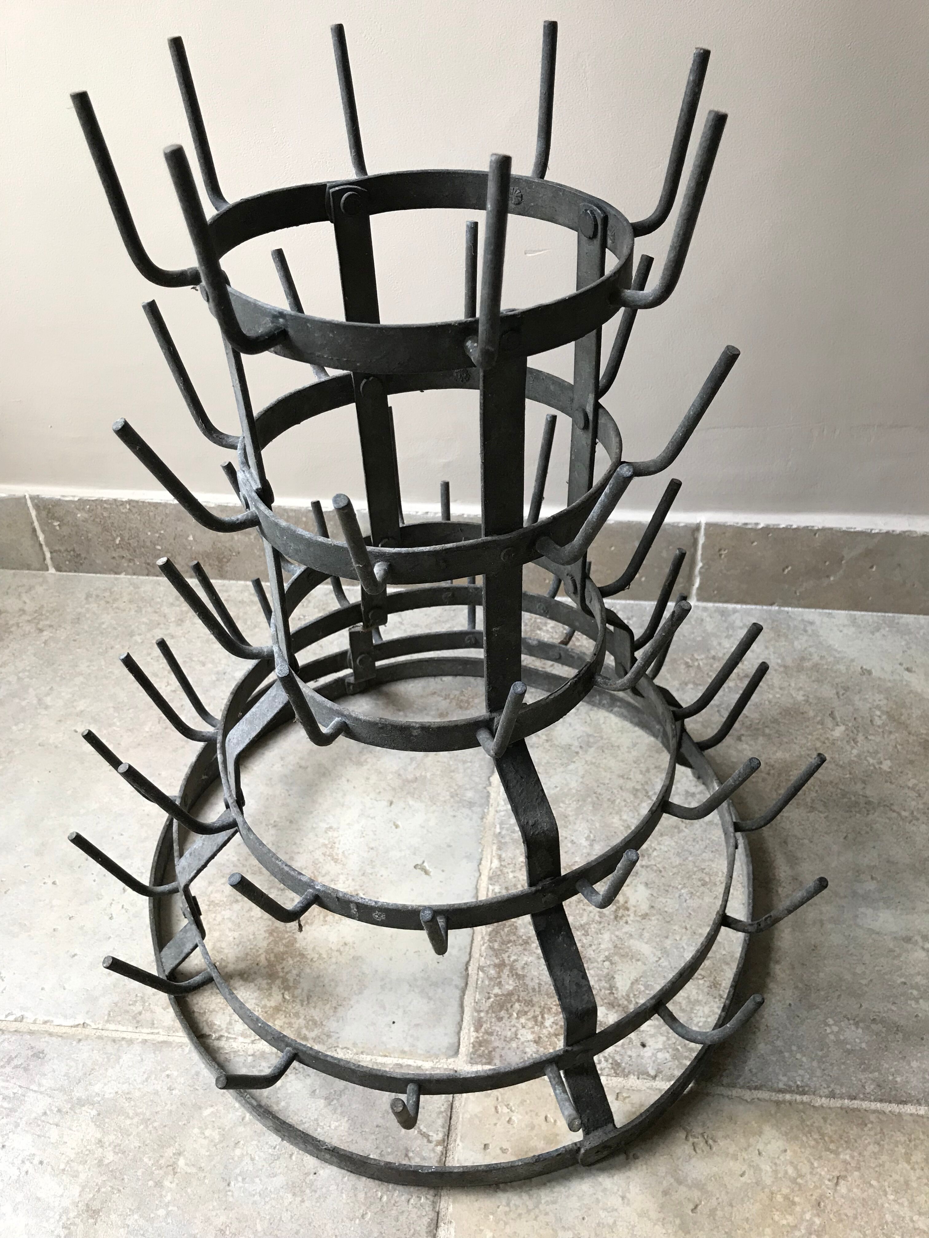 Old metal hedgehog bottle holder