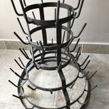 Old metal hedgehog bottle holder