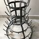 Old metal hedgehog bottle holder