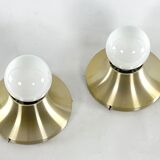 Stilux Milano, vintage round gilded aluminum wall lamps from 60s. Set of two