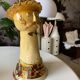 Terracotta plant holder head shape