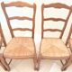 8 Straw chairs with high backs in solid wood