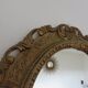Golden baroque oval mirror, 60s-70s
