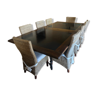 Large table in black stone and wood with 8 chairs
