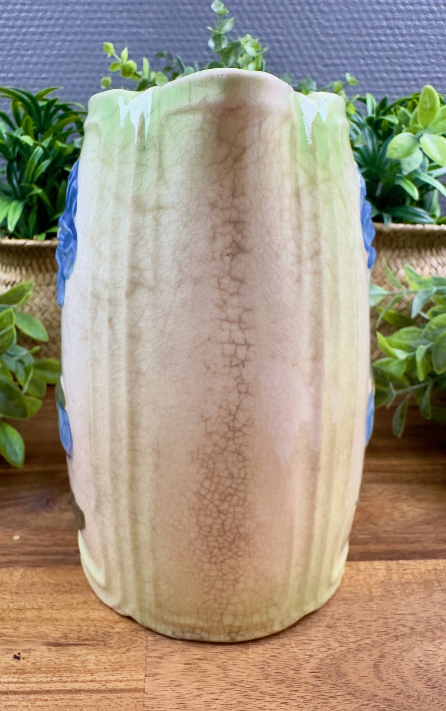 Vintage blue floral ceramic pitcher.