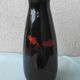 Vase en bois laqué