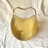 Vintage hammered brass log holder