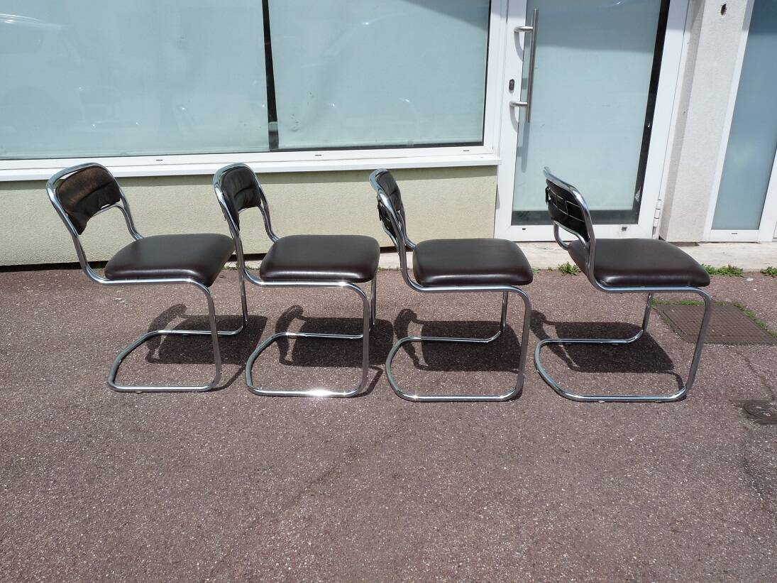 Set of 4 chrome metal and vintage leather chairs