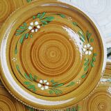 Set of glazed ceramic plates