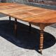 Extendable round table (with extensions and flaps), cherry wood.