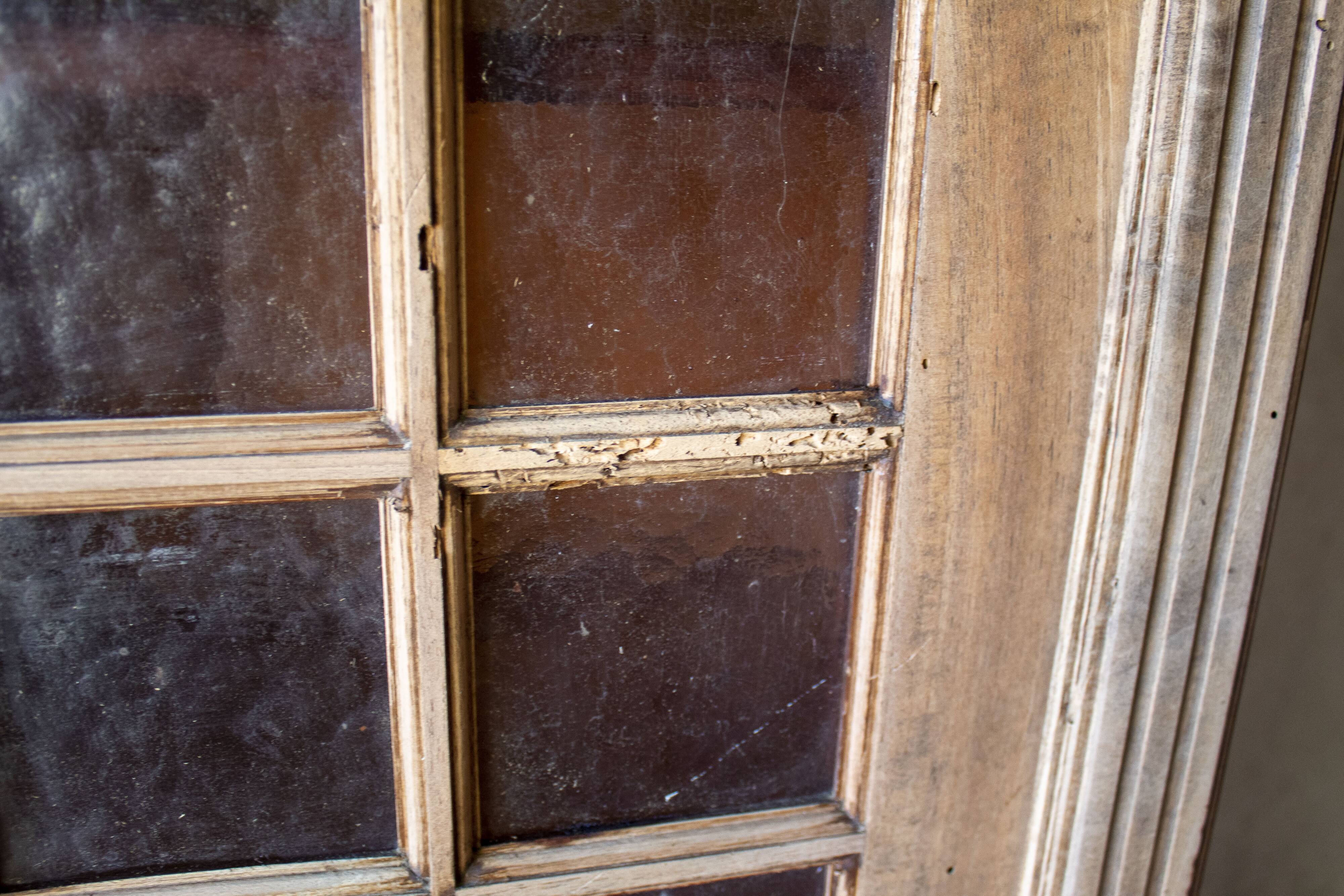Glass-fronted cabinet from 1915, solid wood.