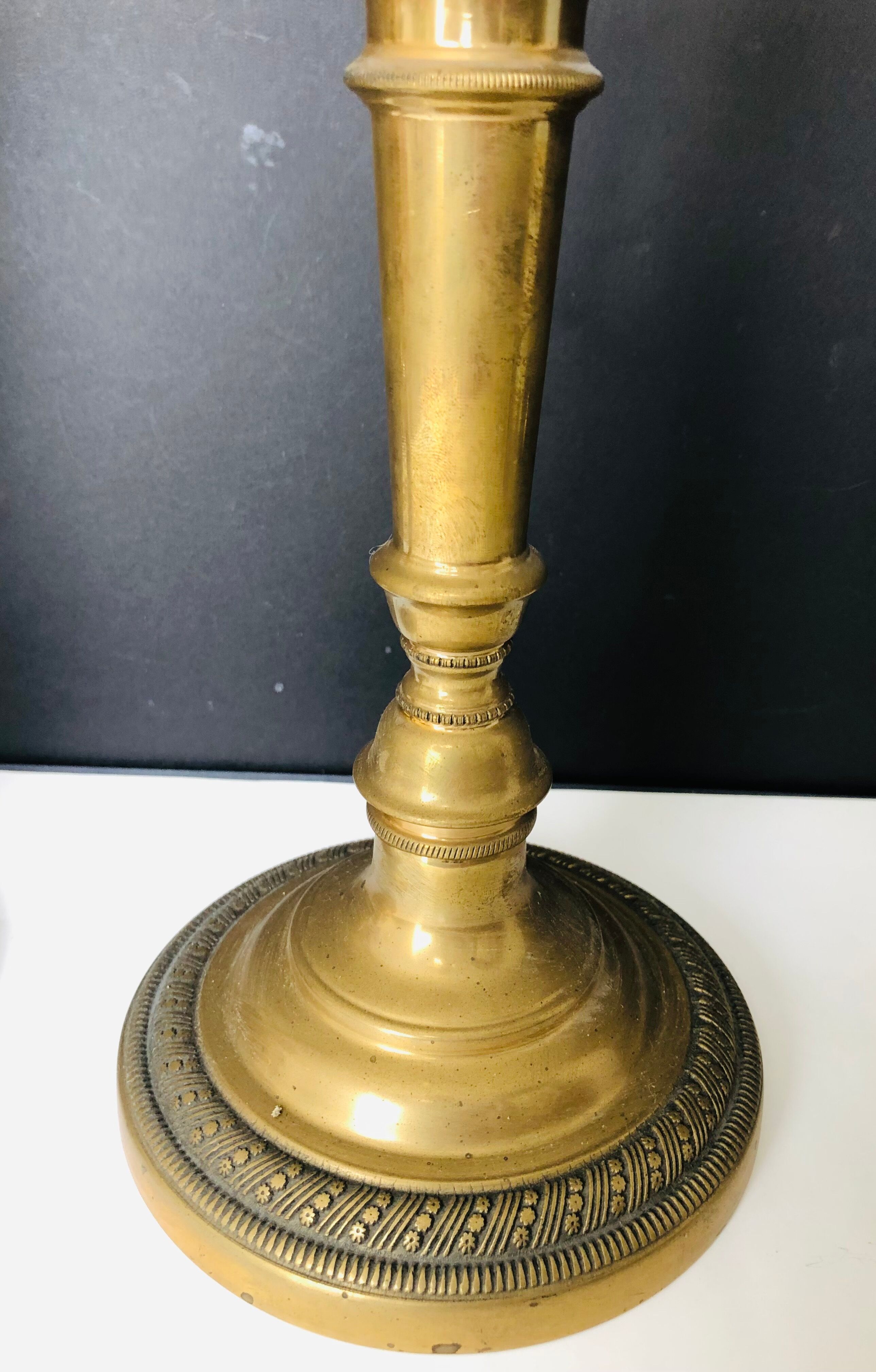 Pair of torches or candle holders in bronze