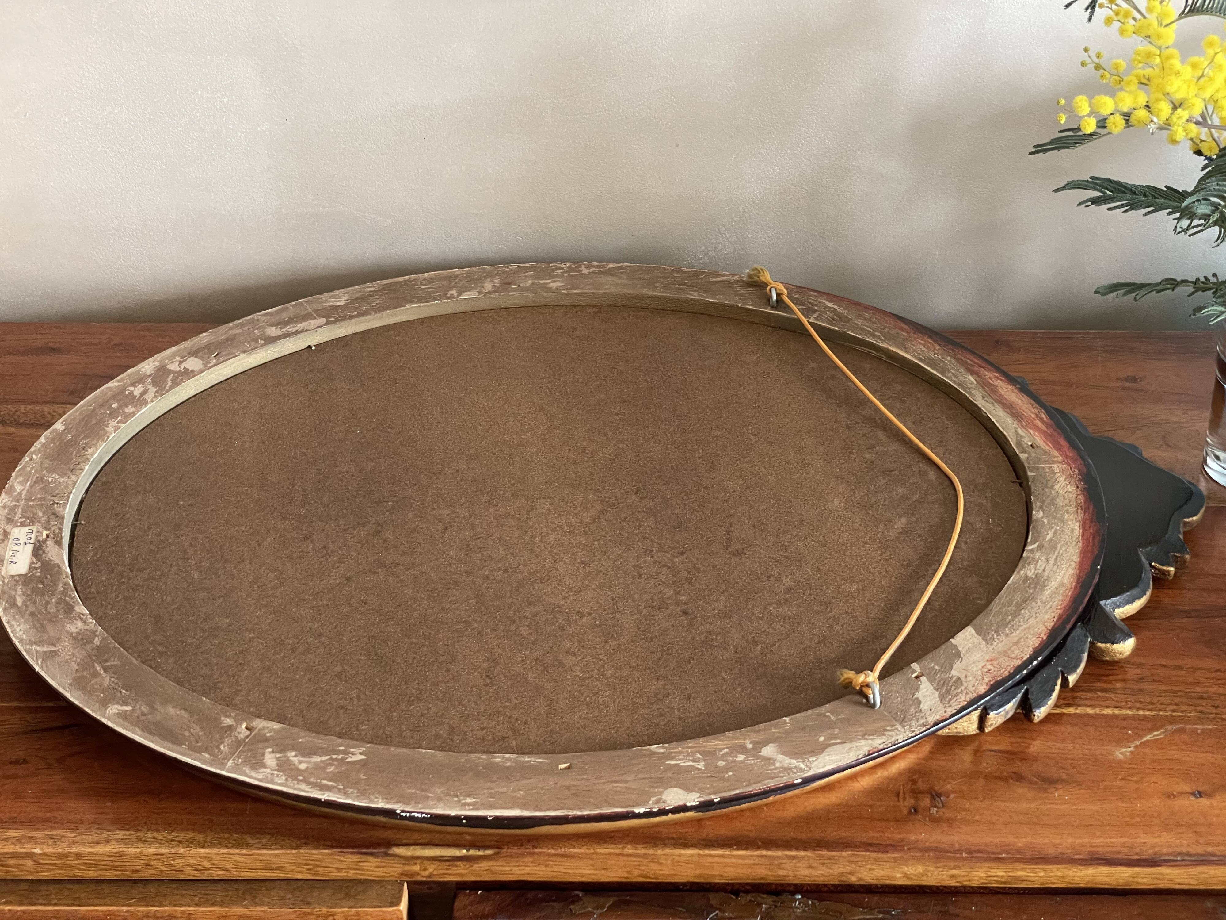 Oval mirror black and gold wood 65x50cm