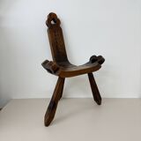 Brutalist hand carved oak Spanish tripod chair , 1970s