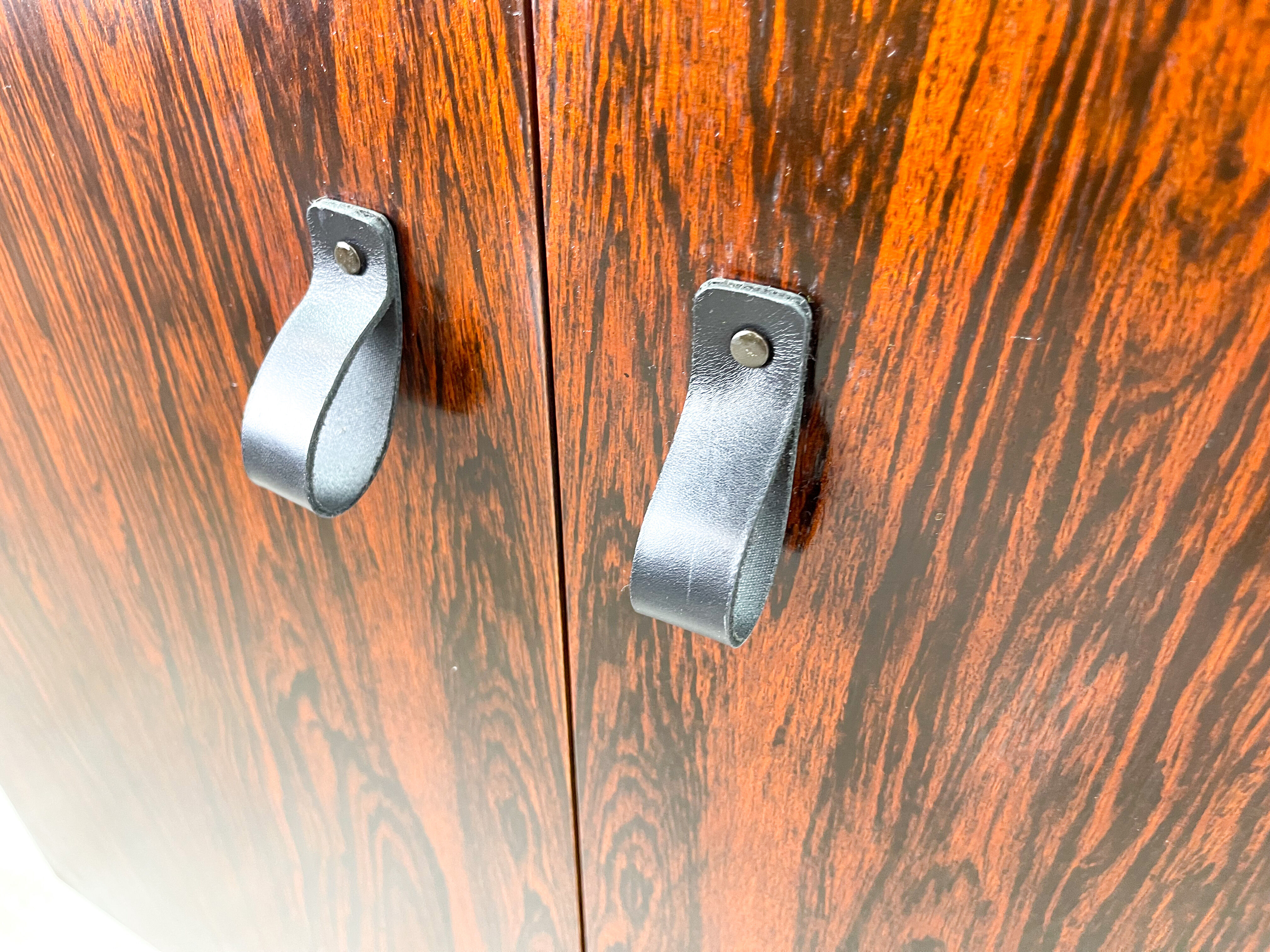 Rosewood cabinet with hairpin legs