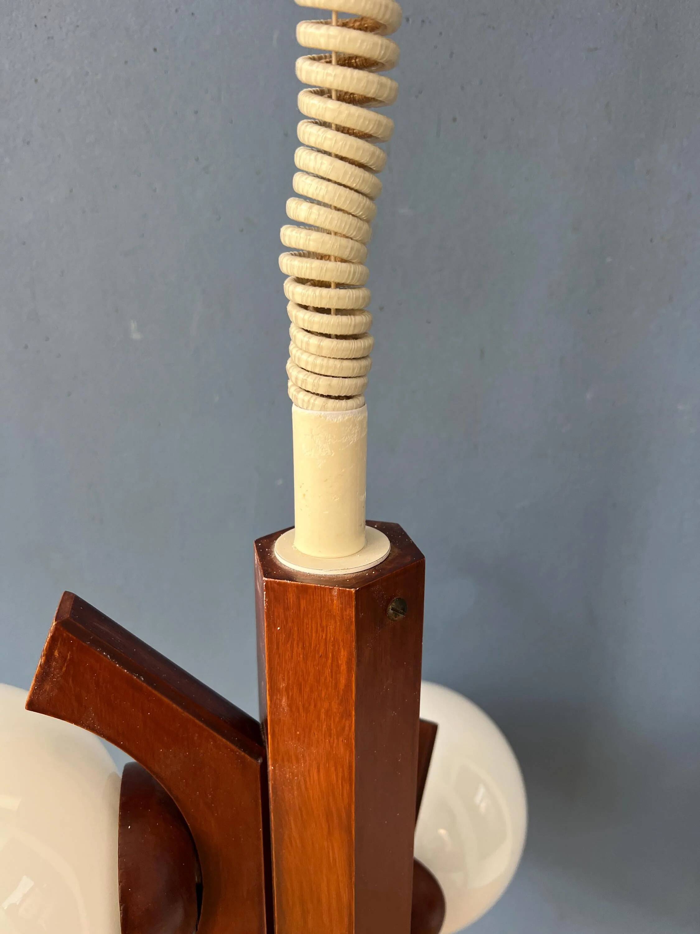 Mid-century brown Bony suspension with opaline glass shade.