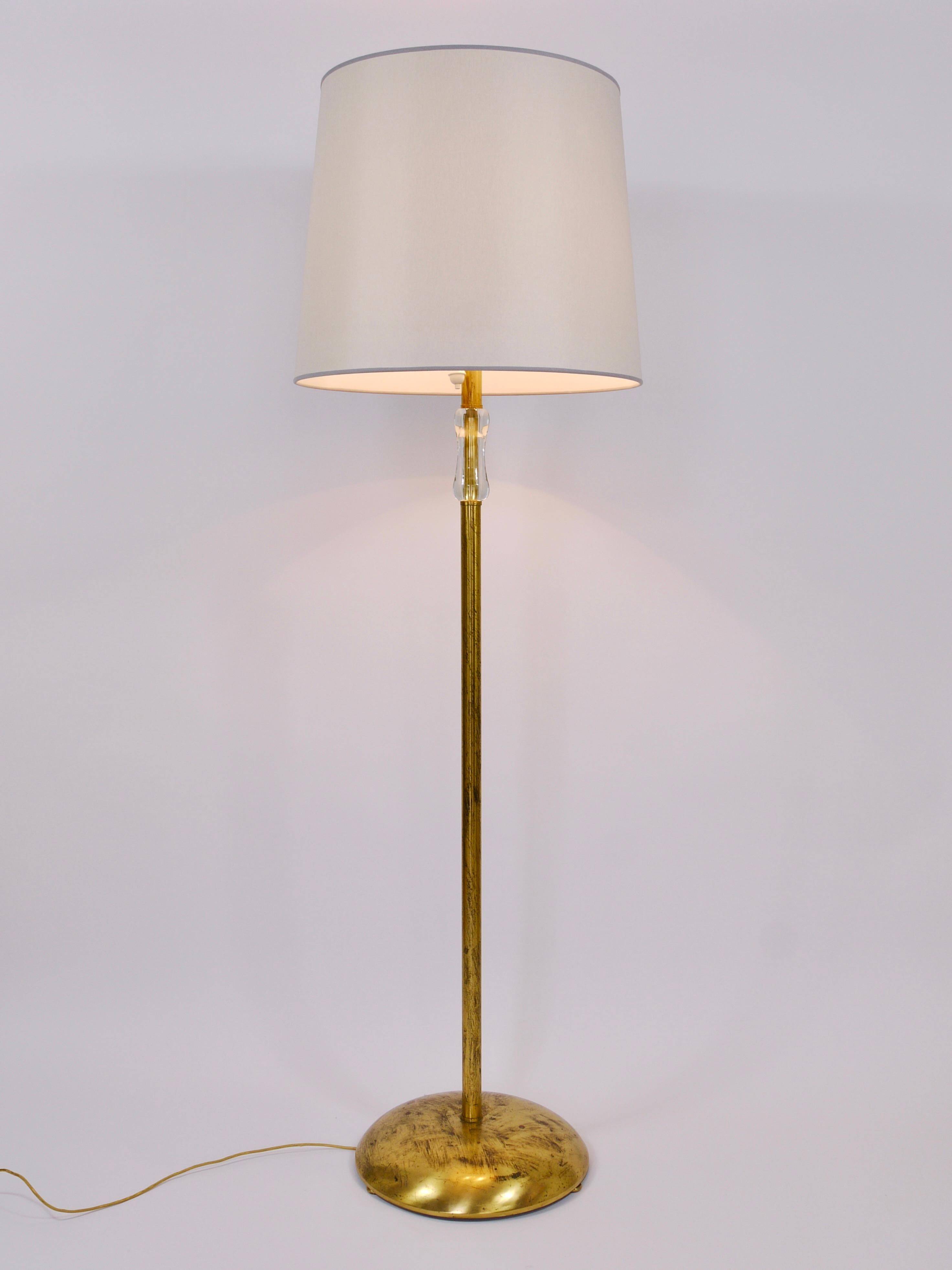 Bakalowits floor lamp from Vienna in solid brass with a glass handle, Austria, 1950s.