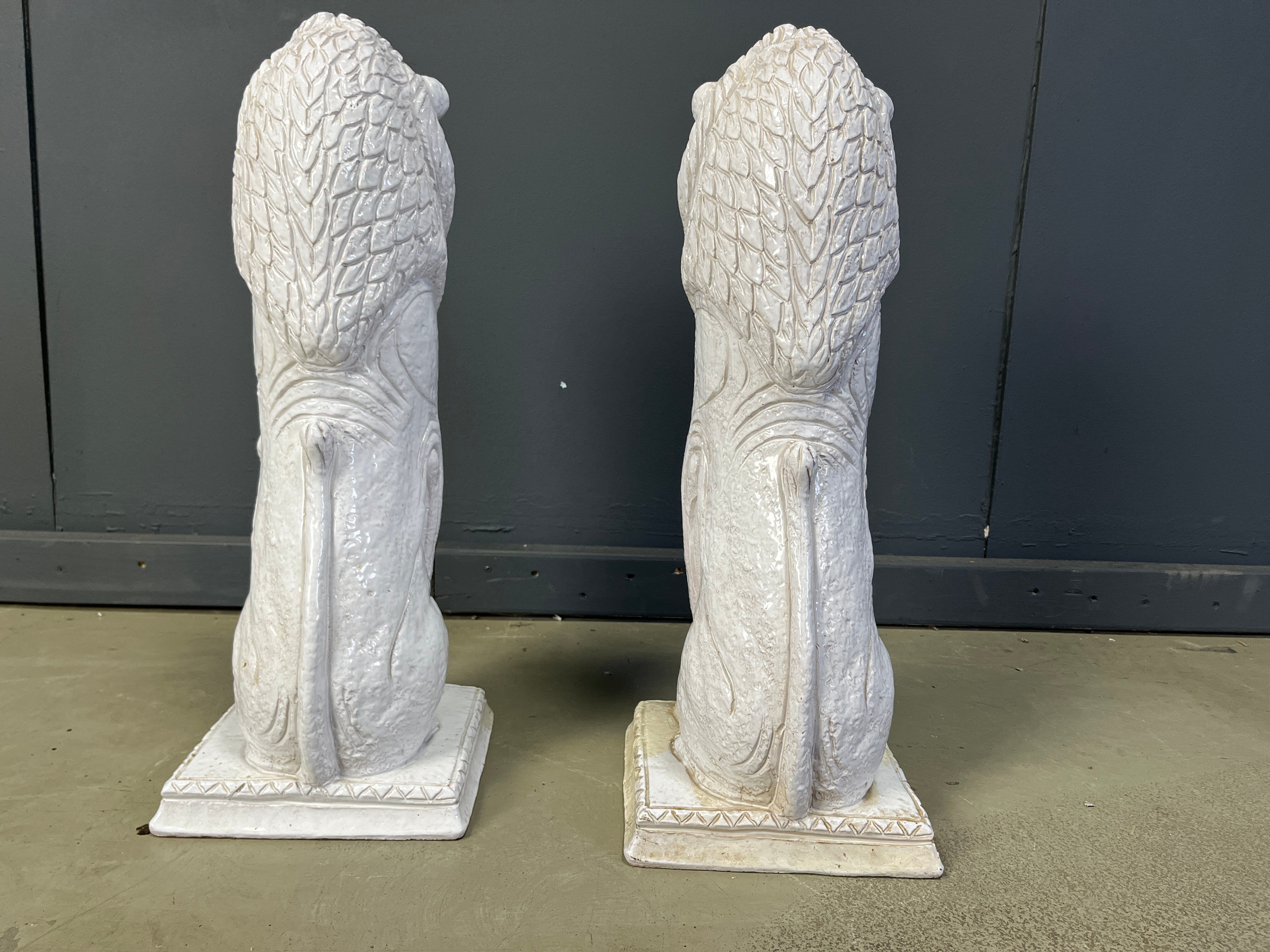 Pair of Renaissance style terracotta lion sculptures, 1950s