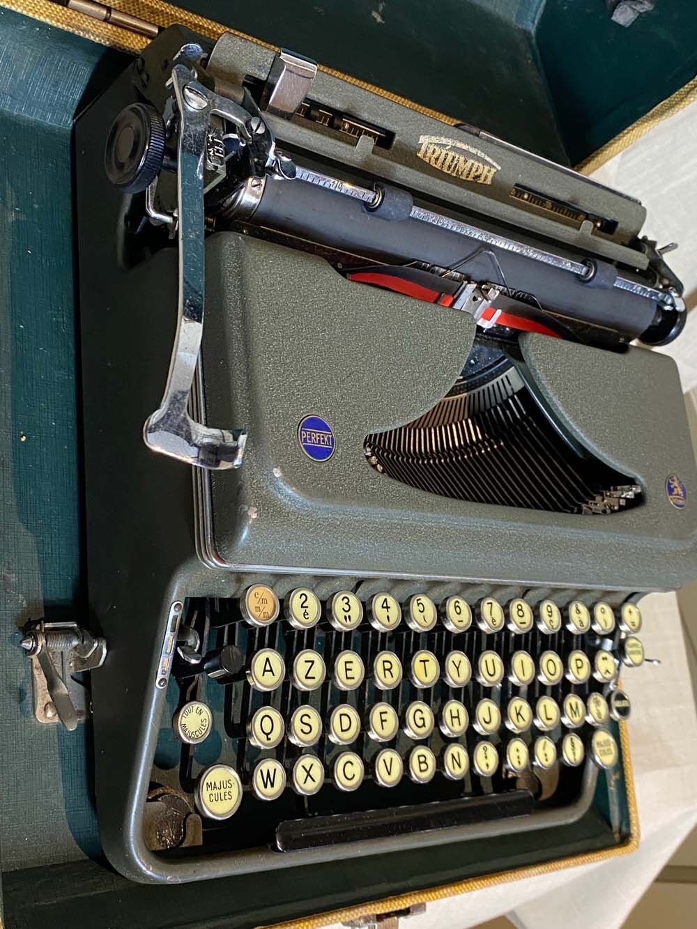 Triumph perfekt typewriter with its transport box.