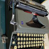 Triumph perfekt typewriter with its transport box.