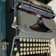 Triumph perfekt typewriter with its transport box.