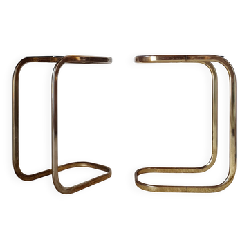 A pair of retro golden metal side tables from the 1970s.