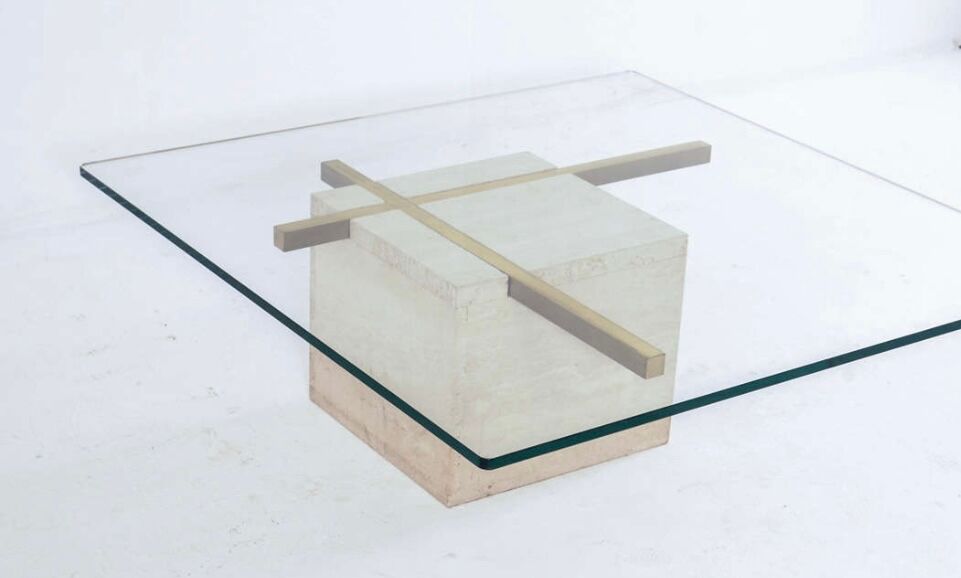 Coffee table with travertine gold-plated cross base and glass top