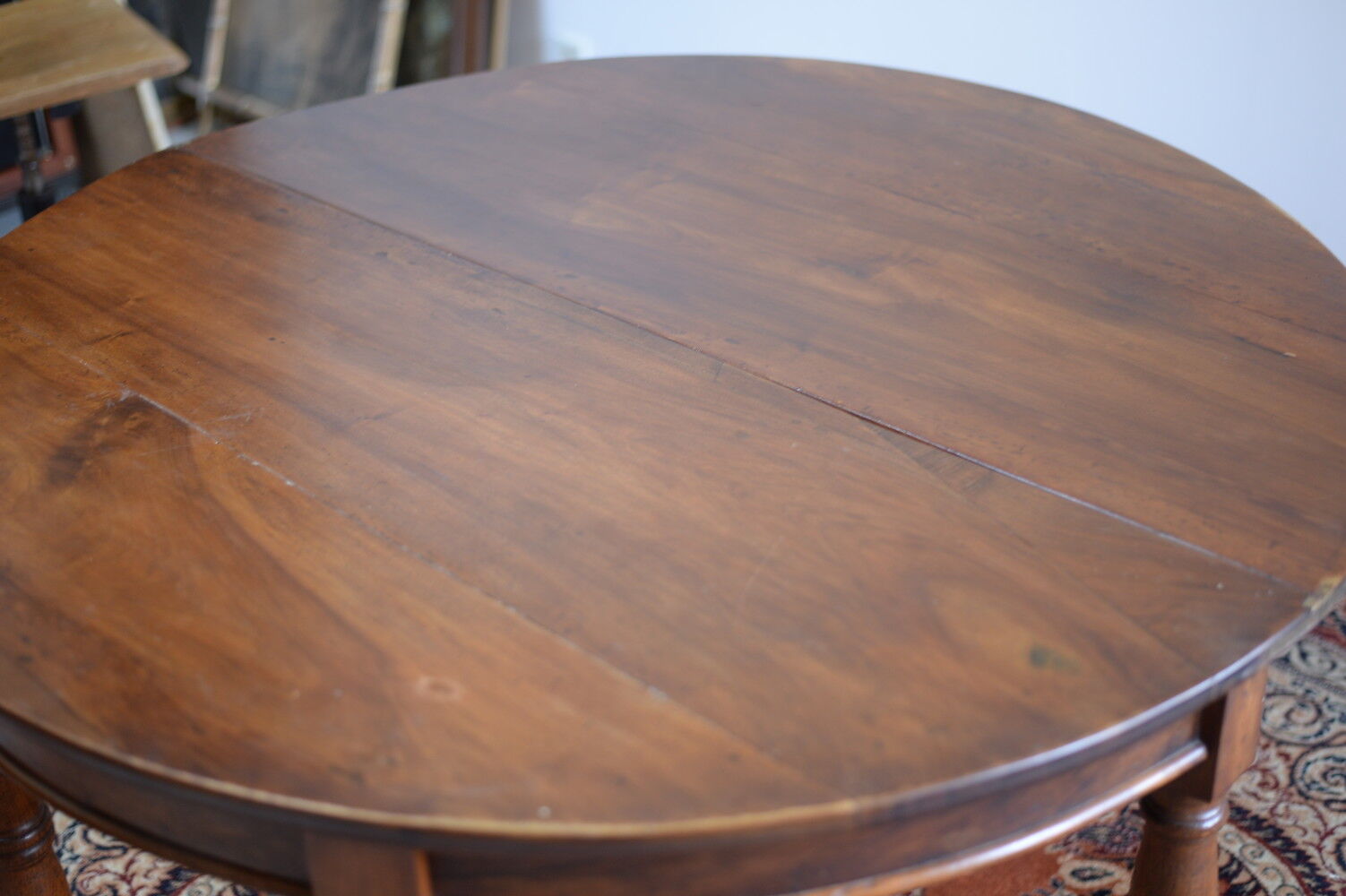 Ancient half moon walnut table