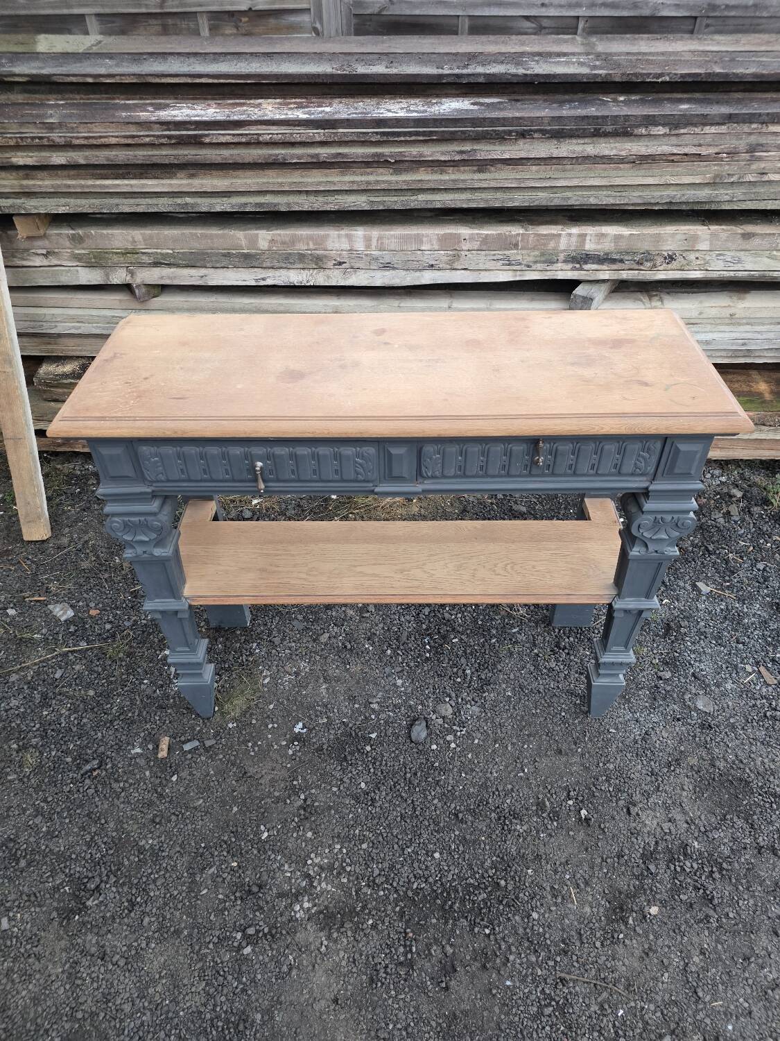 Console in patinated solid oak, late 19th century.
