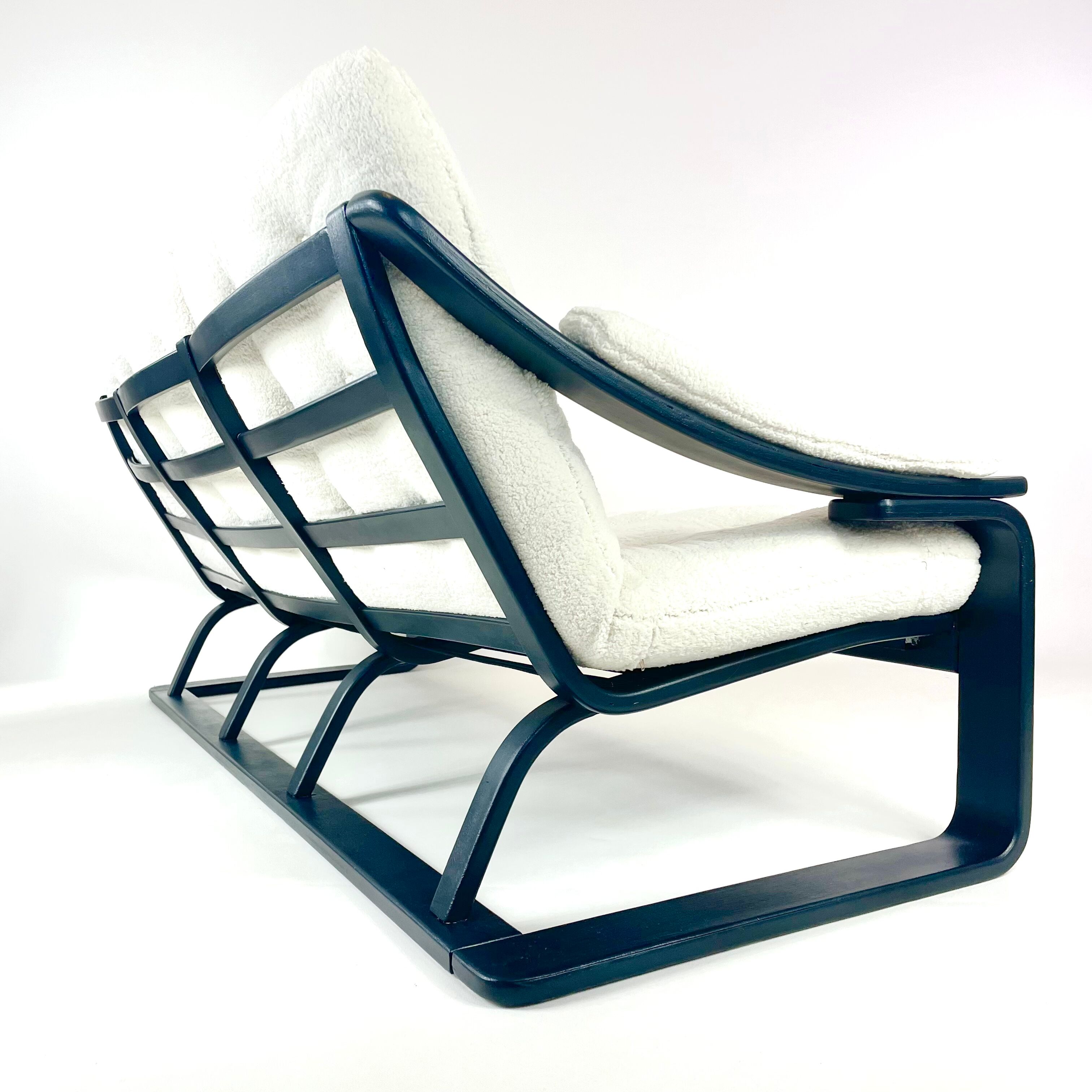 Three-seater sofa, removable cushions reupholstered in white teddy, circa 1970