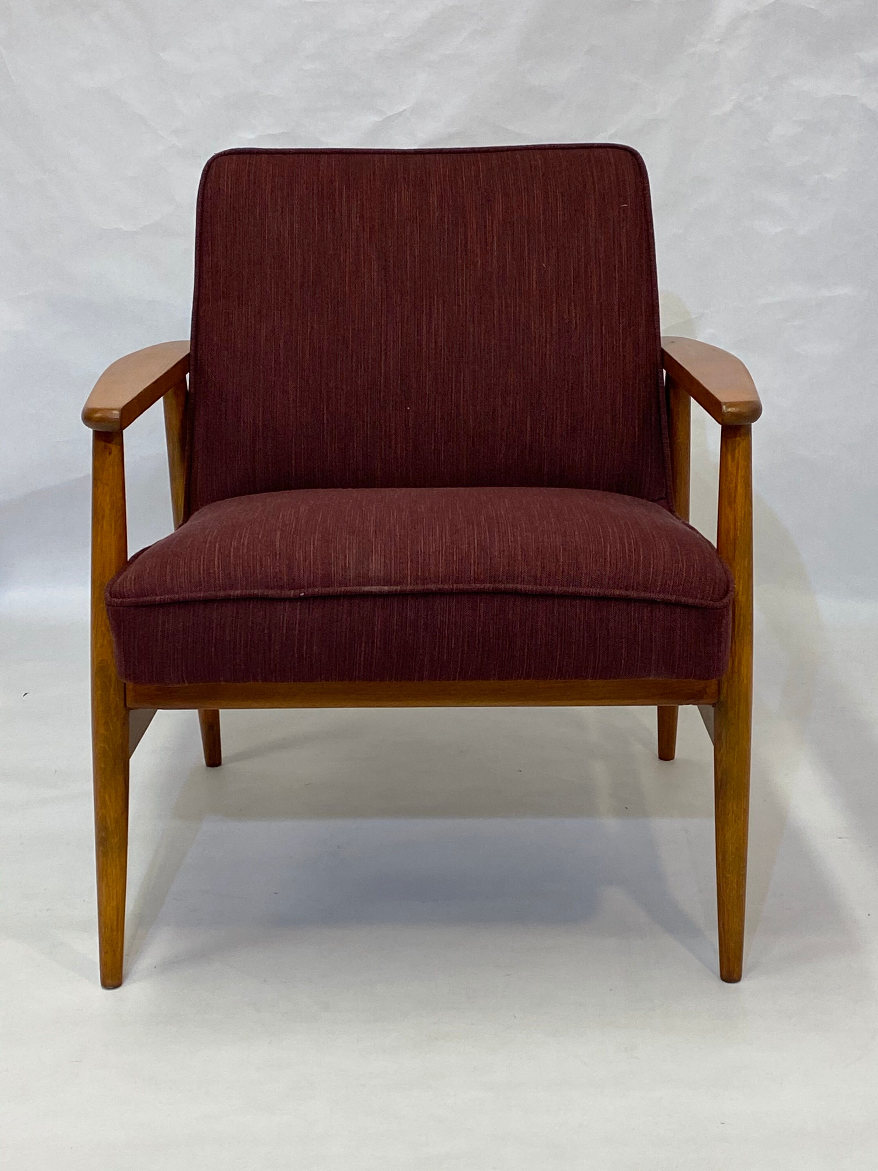 Chair created by Mr. Zieliski year 60 burgundy fabric.