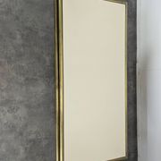 Table basse des années 80 en tubes de laitons et stratifié