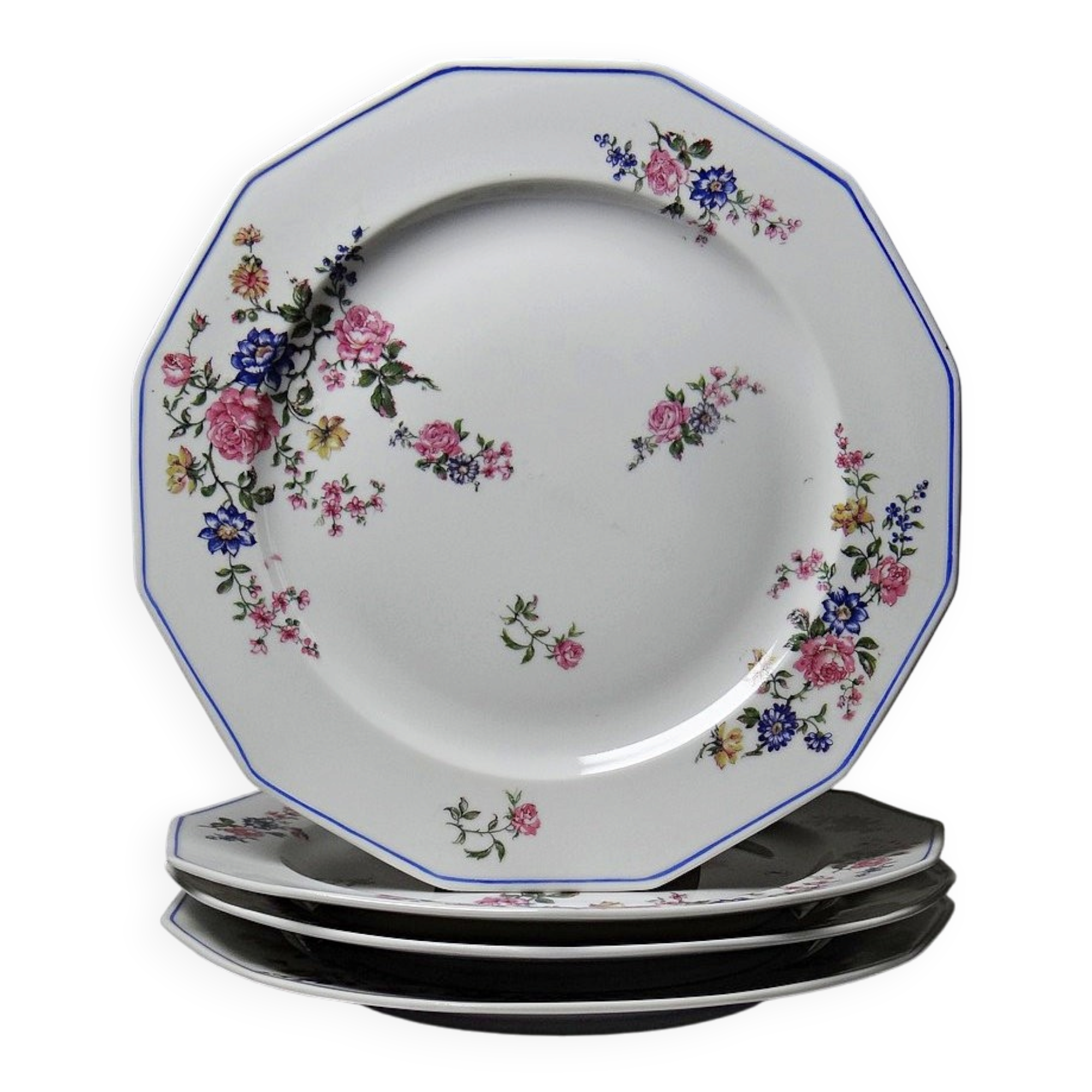 4 flat plates by Bernardaud, Limoges porcelain, floral decoration from the 1920s to 1950s.