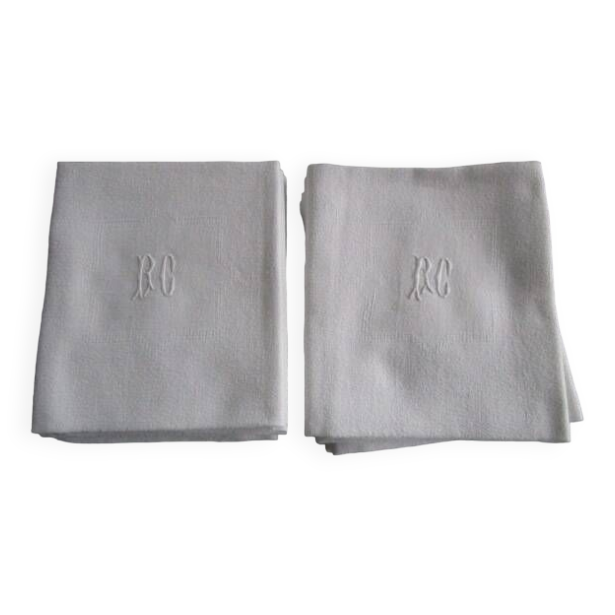 11 large old damask napkins, monogrammed