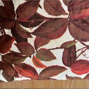 Vintage cushion with virgin vine leaf pattern.