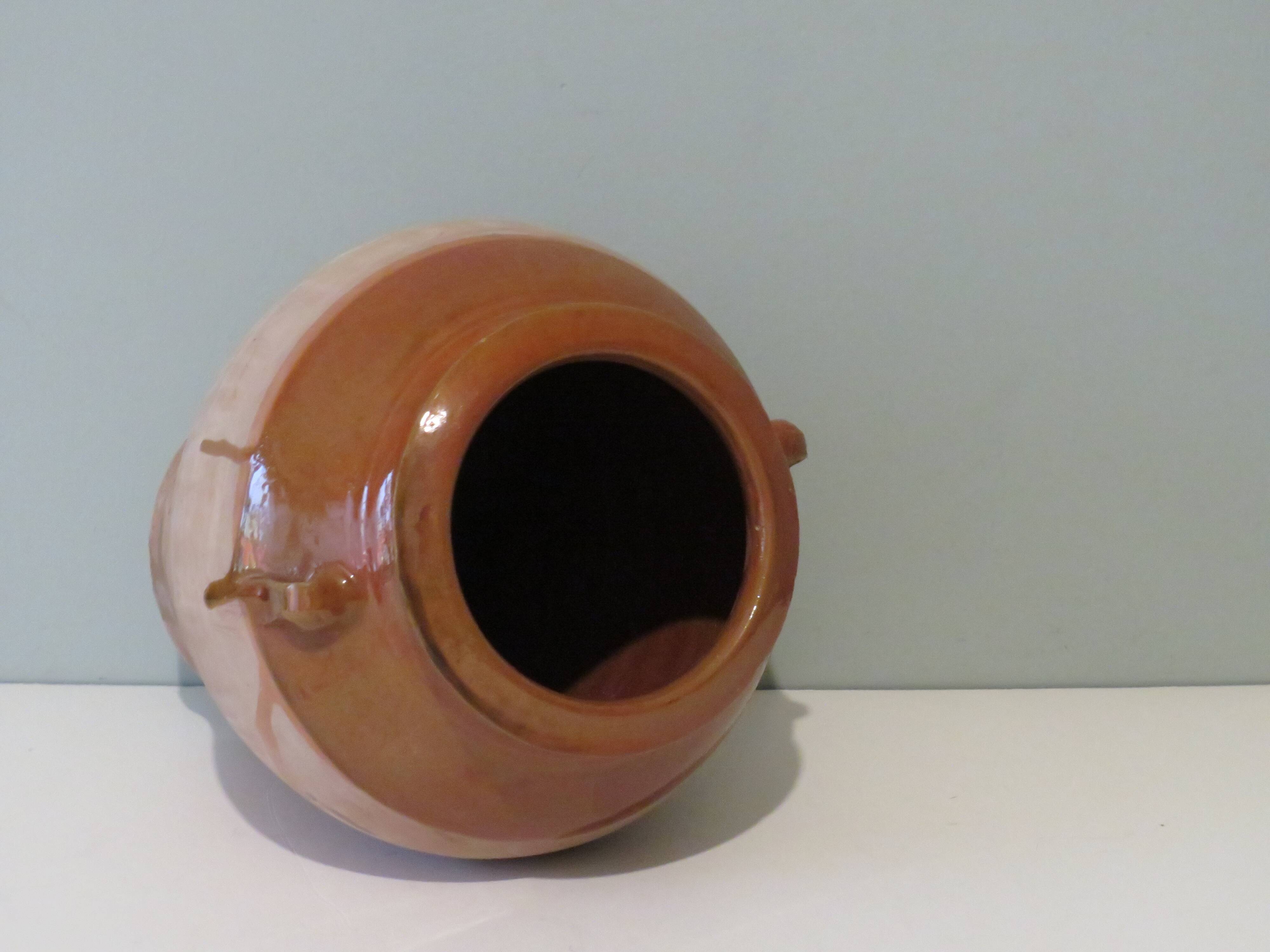 Ancient vase in natural terracotta