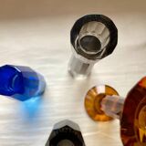 4 designer candle holders in colored glass