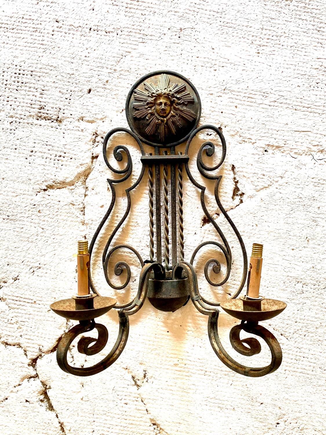 Pair of neoclassical wrought iron wall lights