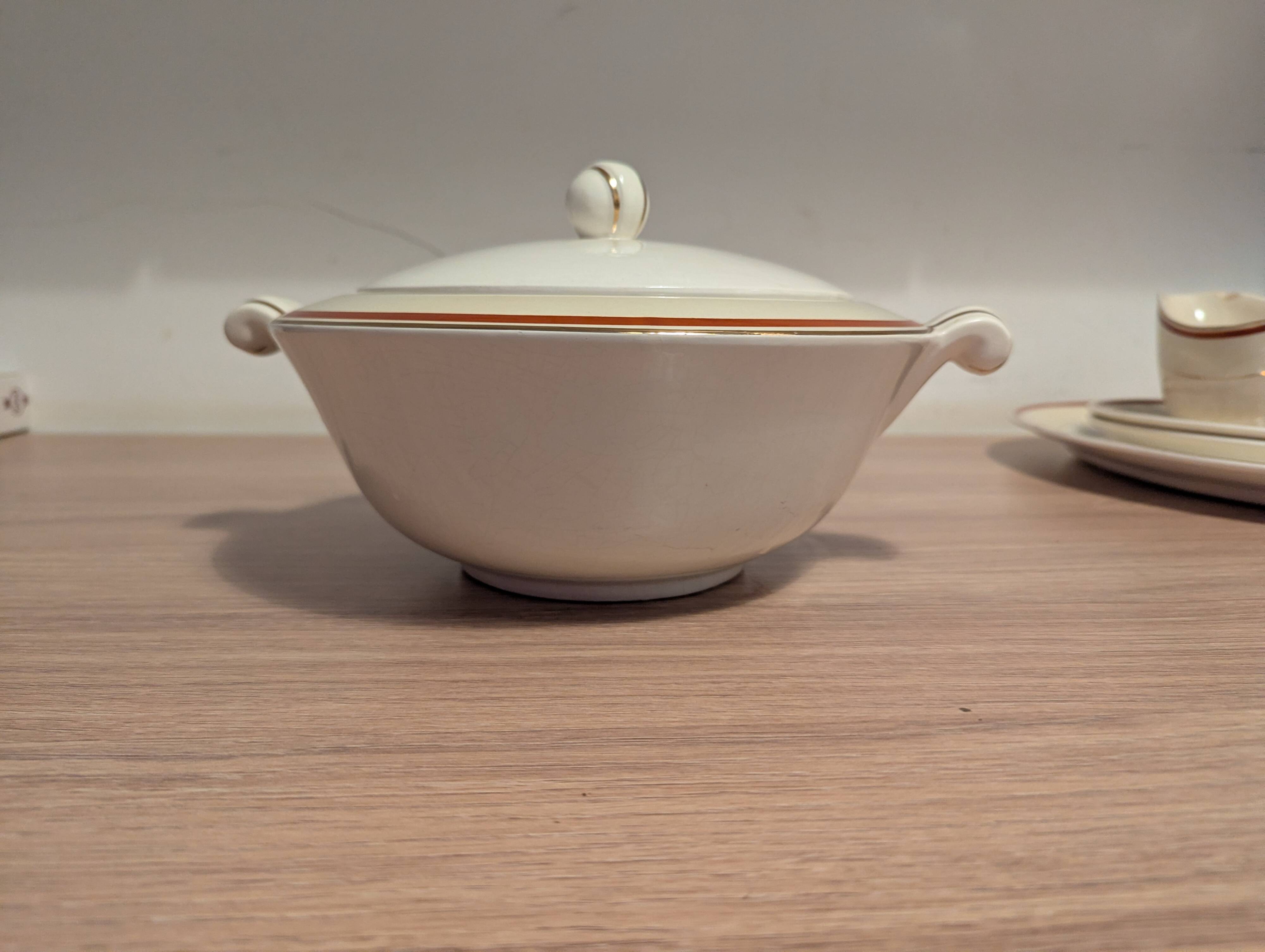 Large Longchamp set in France in earthenware Tea service, serving pieces