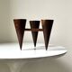 Scandinavian tripod candle holder in carved wood, design from around 1970.