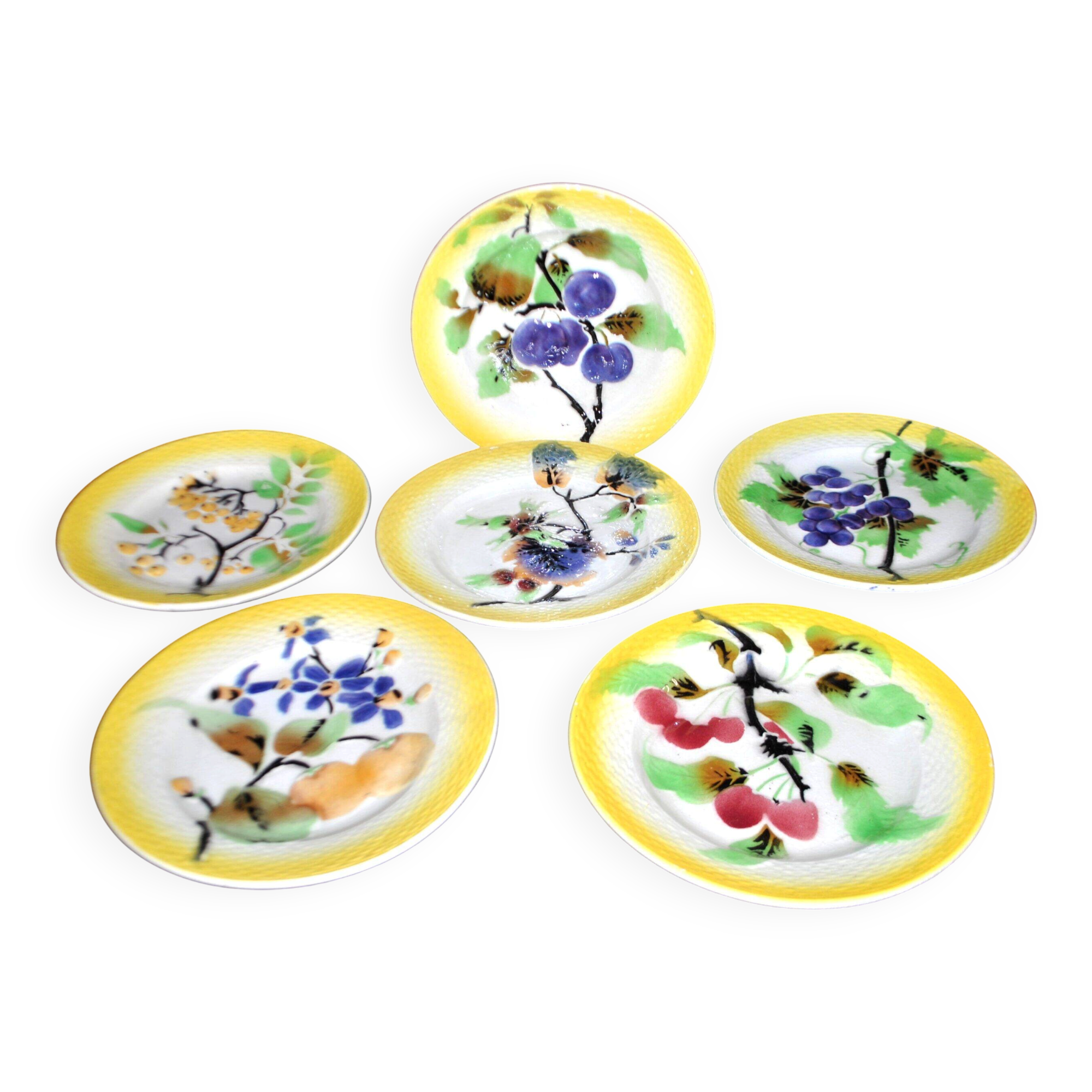 Orchies set of 6 yellow earthenware dessert plates with stencilled fruit decoration.