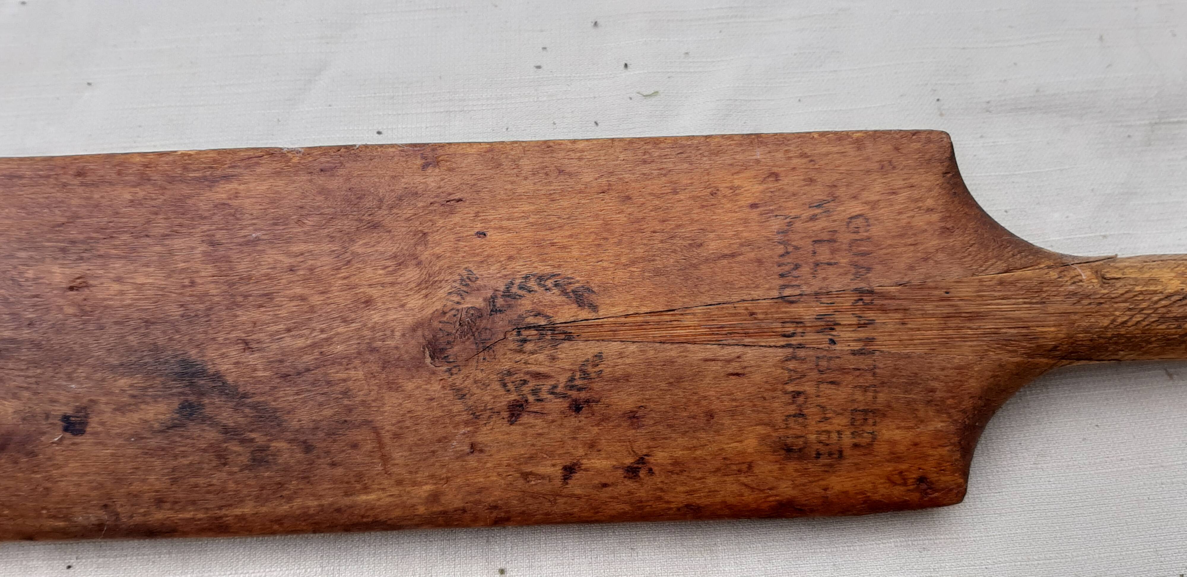 Ancient cricket bat in wood