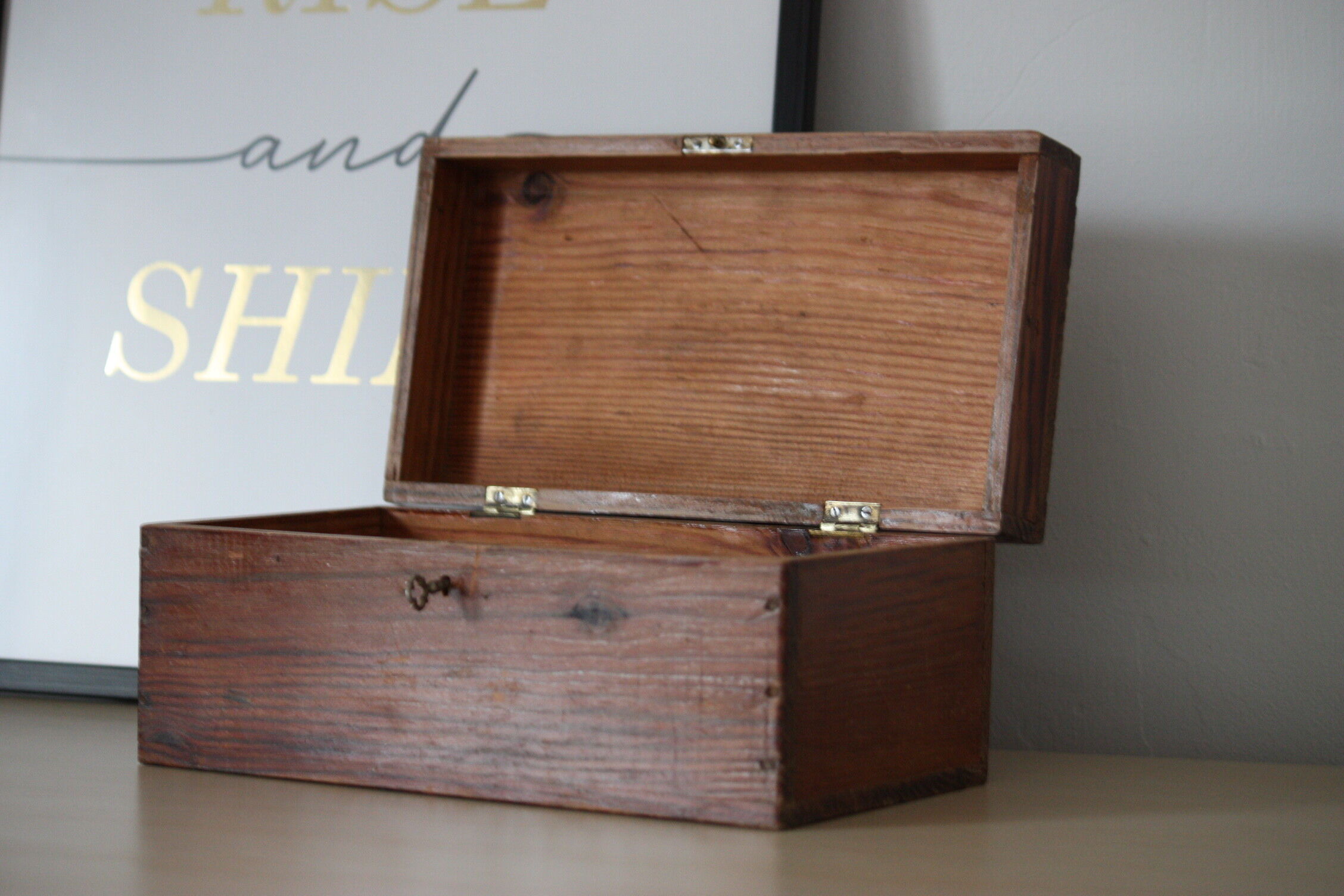 Carved wooden box with lock