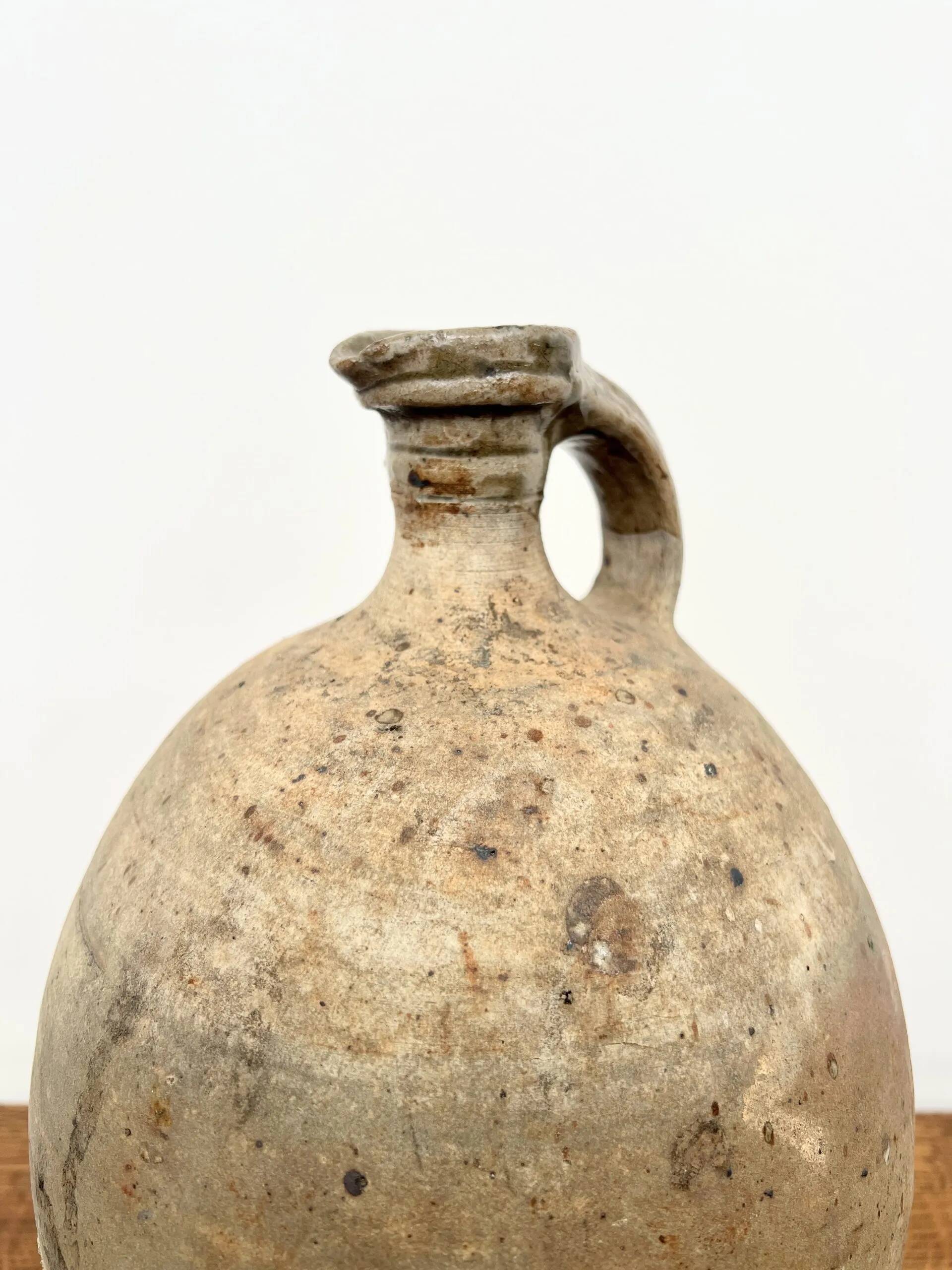 Antique raw terracotta jar
